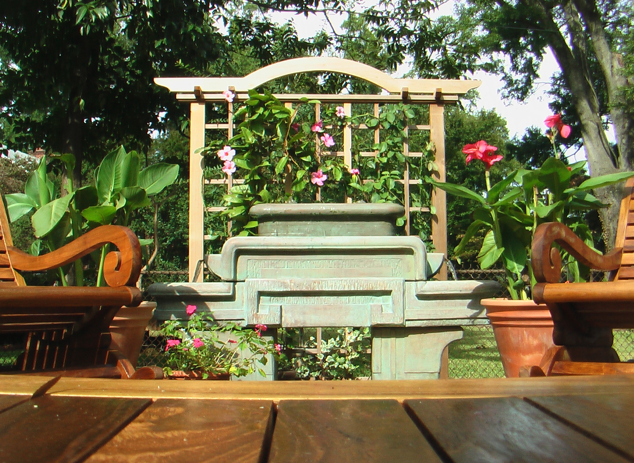 Handcrafted New England Trellis in western red cedar by Trellis Structures, installed in a residential garden